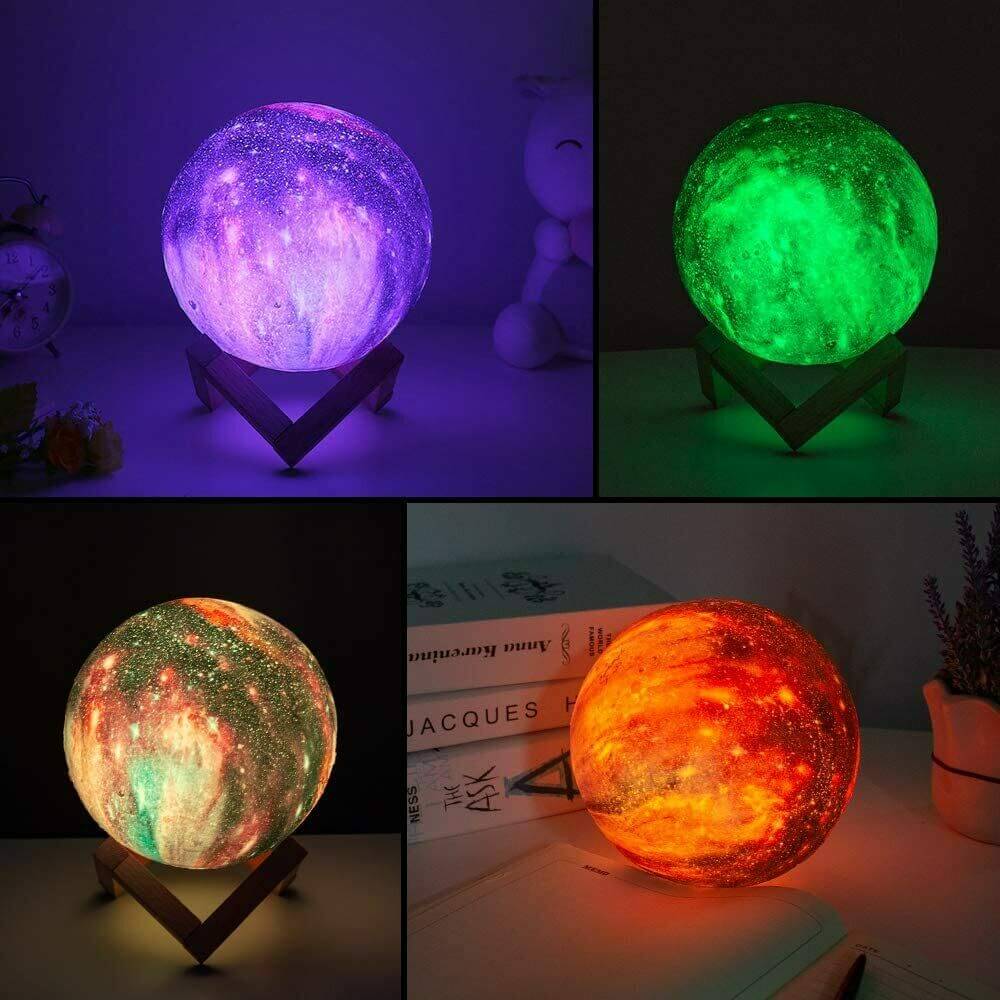 Four color-changing moon lamps glowing in purple, green, orange, and multicolor hues, each on a wooden stand for ambient lighting decor.